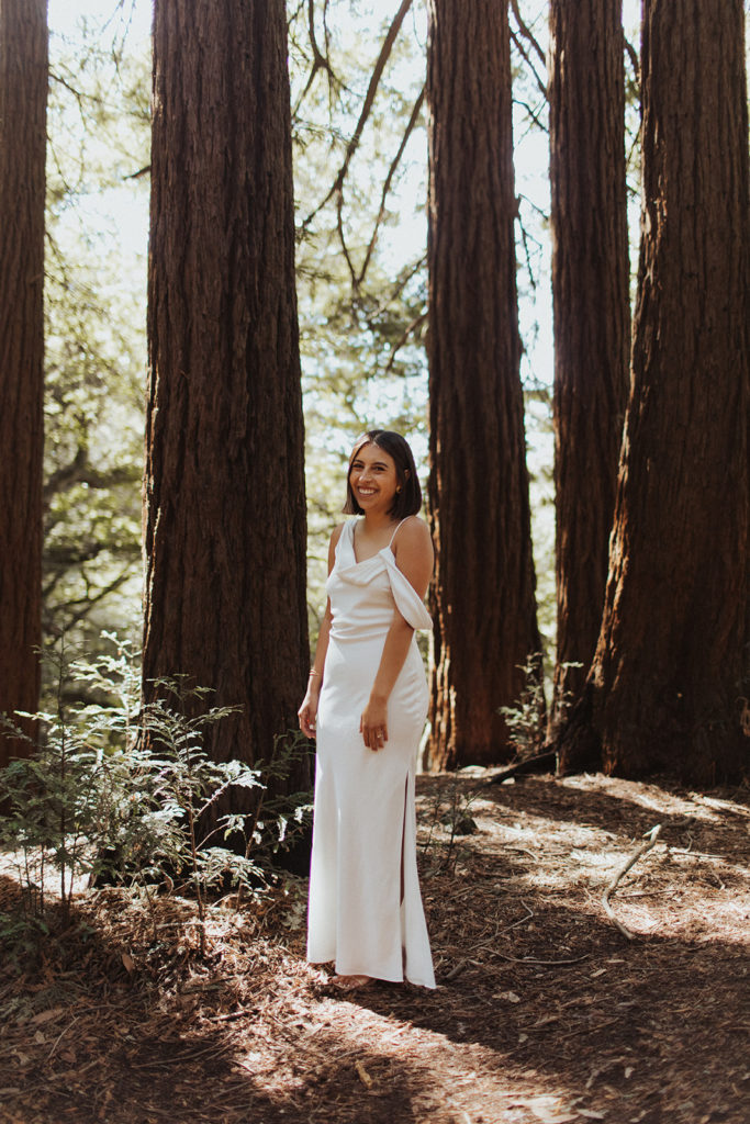 Bride standing among trees | Wedding Industry Inclusivity